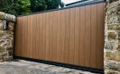 Automatic metal frame composite infill cantilever sliding gate installed in Edinburgh