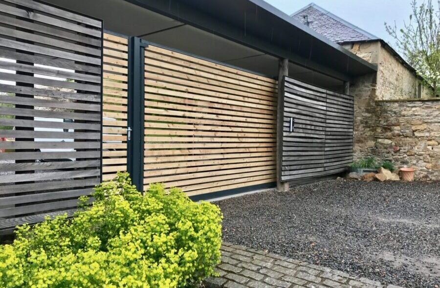 AES (SCOTLAND) LTD installed tracked sliding wooden gate Edinburgh