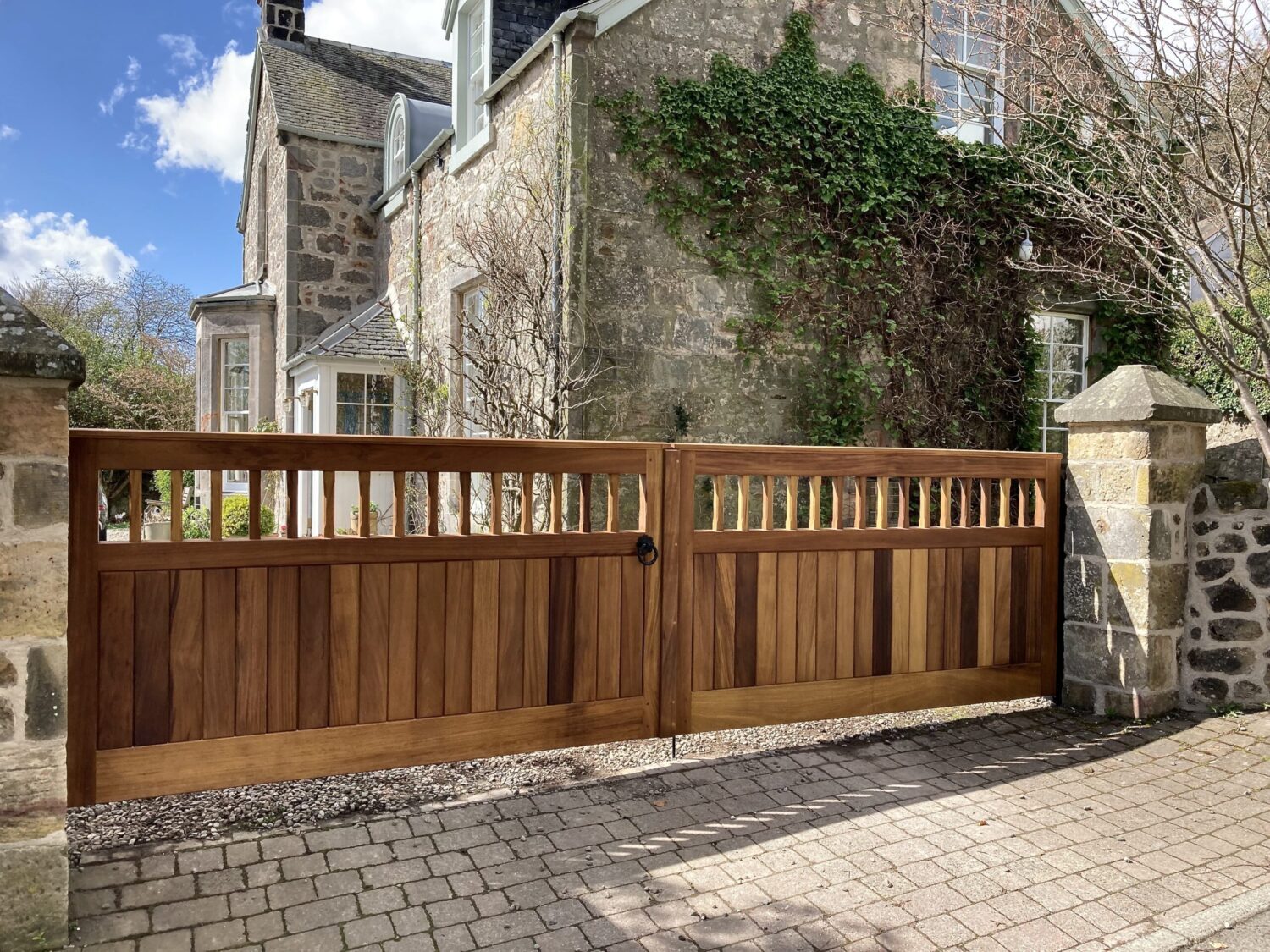 AES recently installed manual wooden driveway gates.