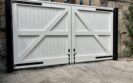 AES (SCOTLAND) LTD recently installed solid white wooden driveway gates in Edinburgh
